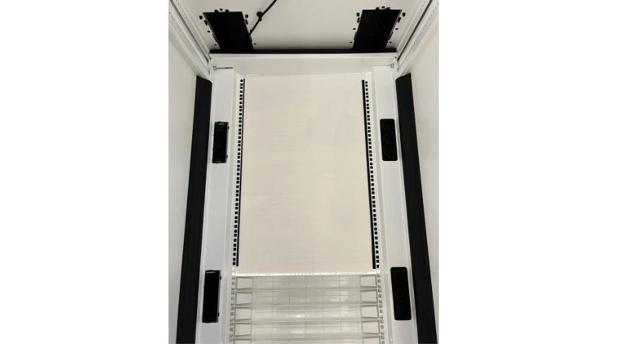 An Air Dam Kit installed in a ZetaFrame® Cabinet seals vertical gaps between rails to prevent bypass airflow.